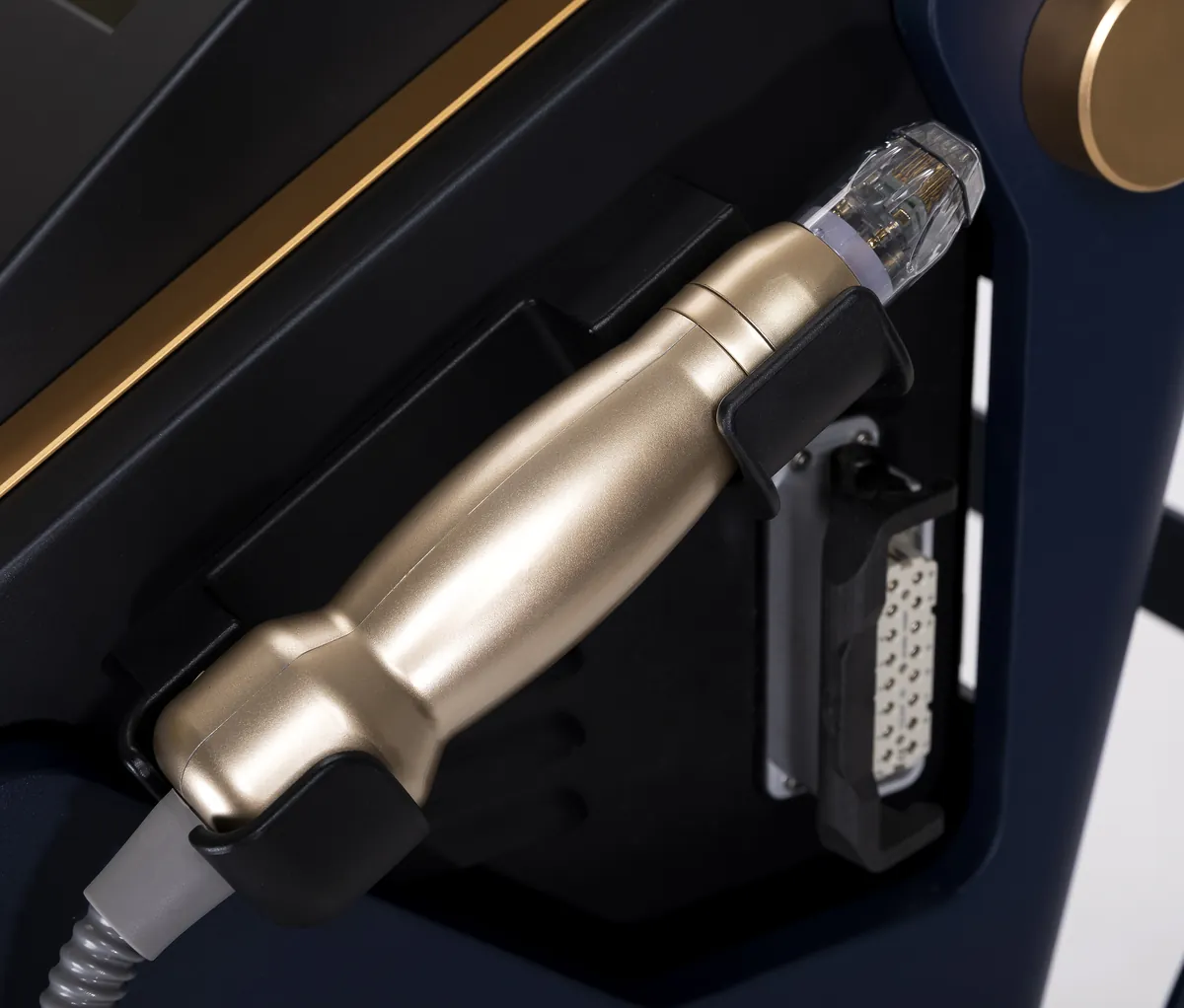 Sylfirm X handpiece docked on the Sylfirm X console
