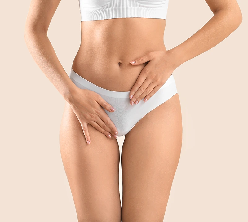 Young woman on light background, closeup. Gynecology concept